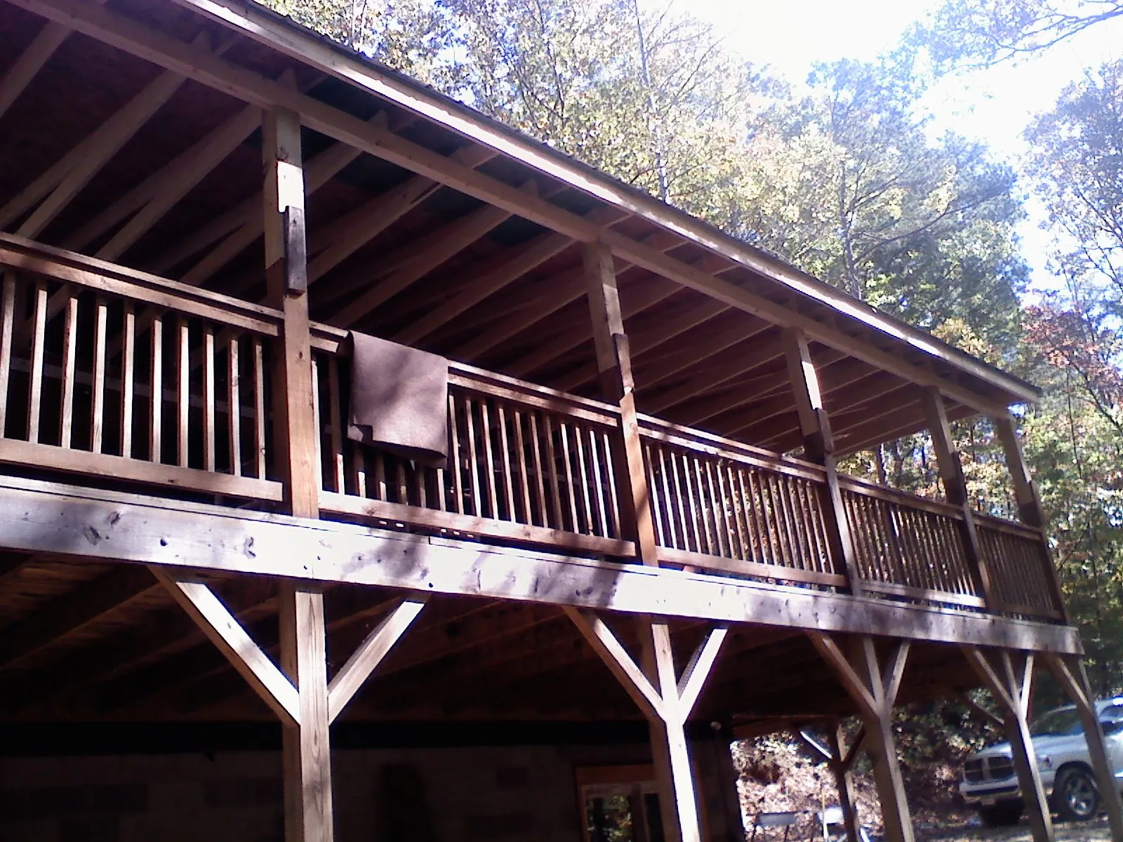 Timber framing under a new elevated porch and deck — Roof Leak Repair in Oglesby by Roofing Brothers
